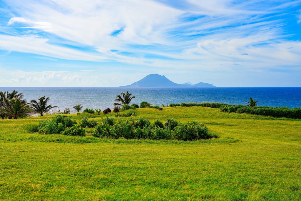 St. Kitts looking at Statia and Saba View of mountainous Saba and Statia (Sint Eustatius) from the grassy north coast of Saint Kitts